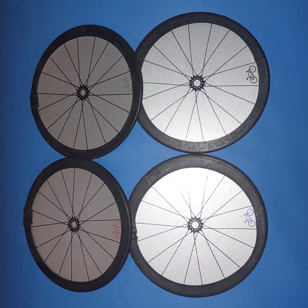 Metal bicycle wheel coasters